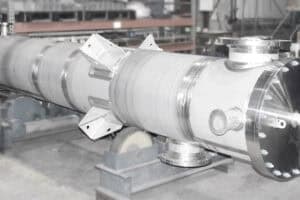 Vertical straight tube exchanger for an industrial multi-stage evaporation process